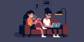 couple on sofa watching youtube online