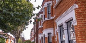 English houses- a typical row of terraced red brick houses in south west London