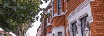 English houses- a typical row of terraced red brick houses in south west London