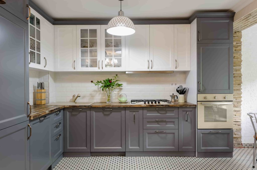 interior of modern luxury grey and white wooden kitchen