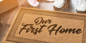 man-and-woman-first-home-on-welcome-mat-4
