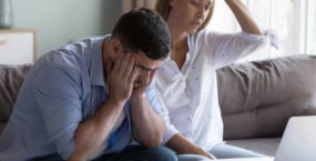 stressed-spouses-manage-family-finances-analyze